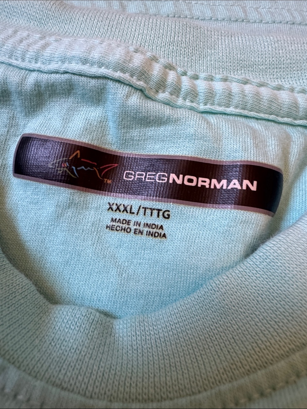 Greg Norman Collection Aqua Pocket Tee with Embroidered Fish - Picture 2 of 3